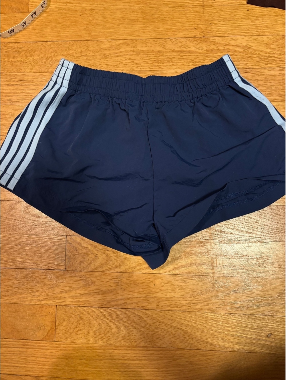 Adidas Navy Blue Athletic Shorts with White Stripes - Size S